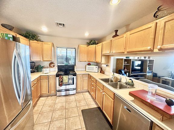 4th image of 13587 E 49th St