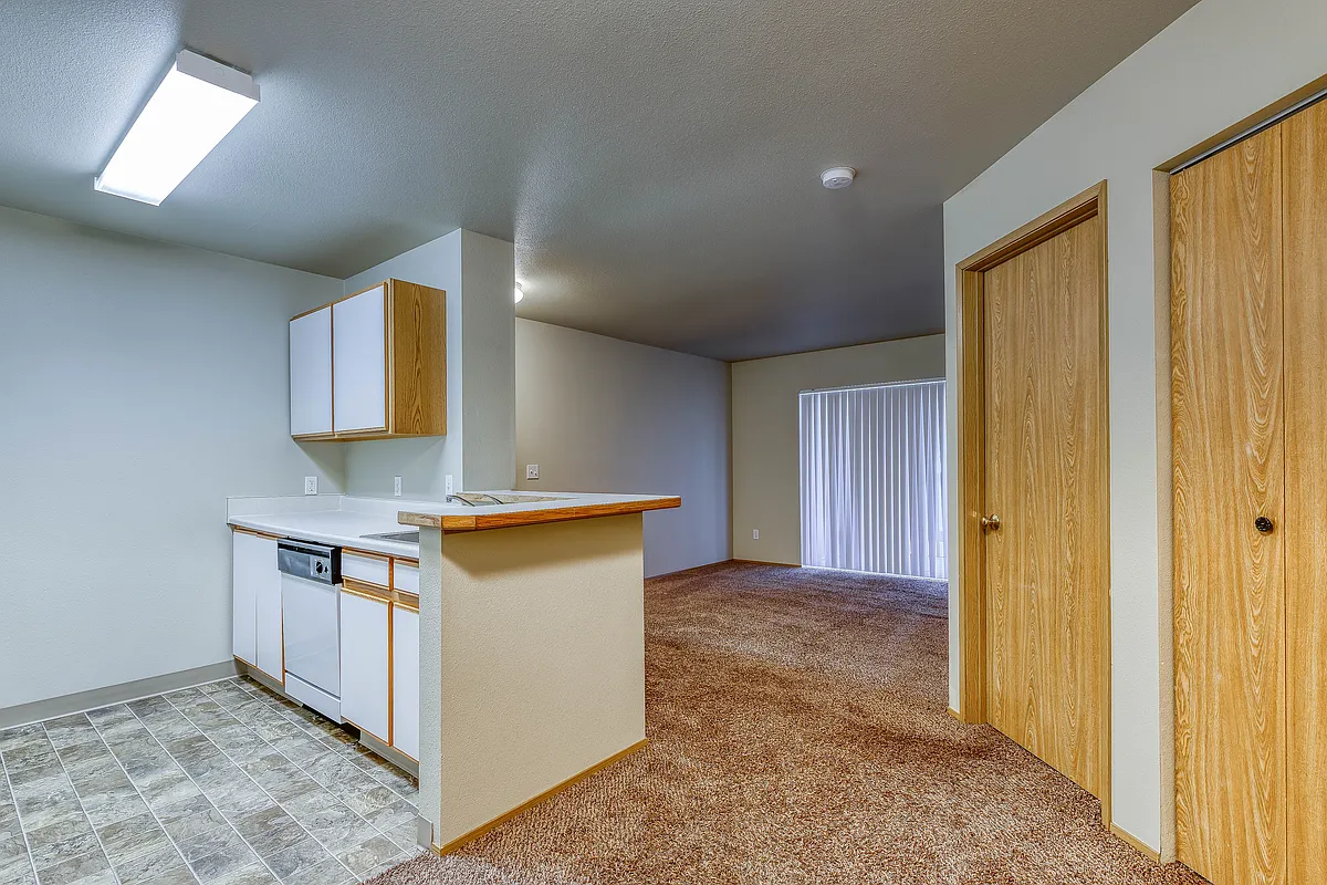 Living Room & Kitchen - Aspen Village Apartments