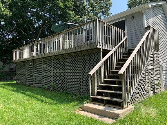 Large deck with slider from dining room and master bedroom