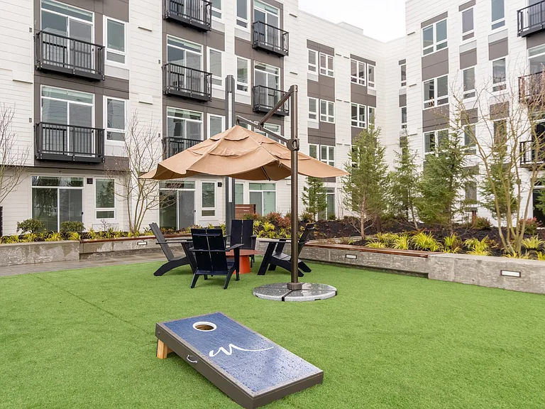 Relax in the landscaped courtyard or play a game of cornhole