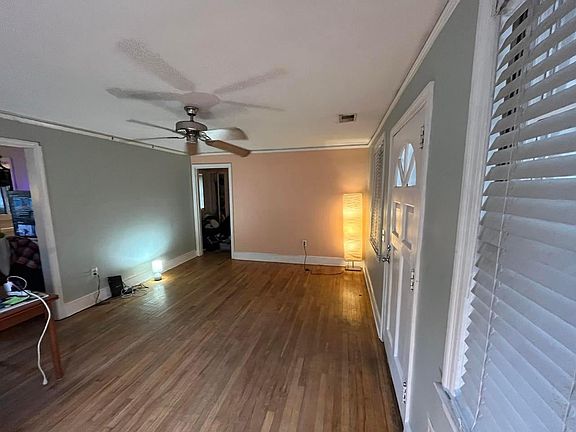 Living room has been re-painted a light gray, as well as the bedrooms, bath, kitchen and hall.
