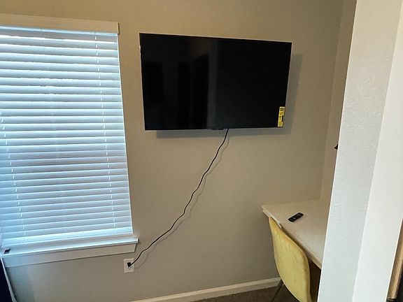 Mounted TV can be moved on swivel arm