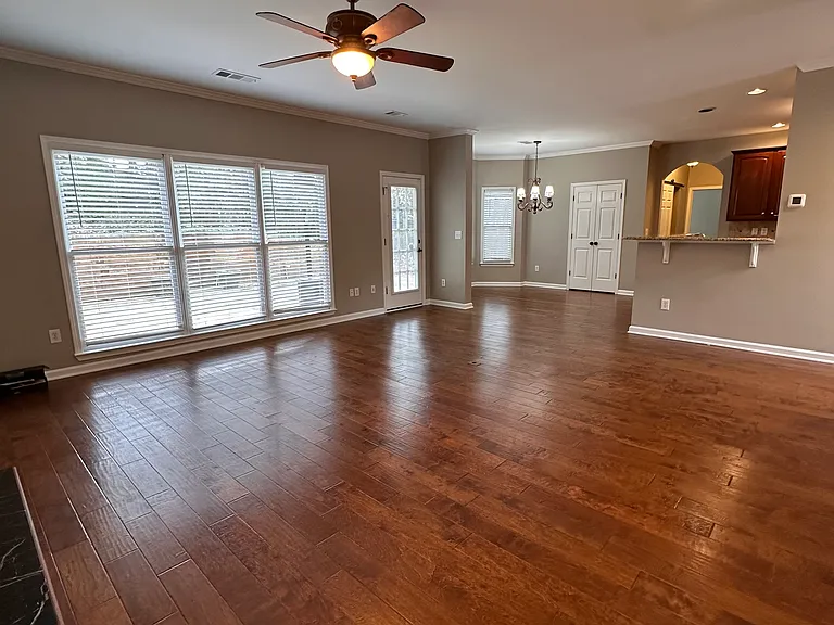 Open Floor Plan with Breakfast Area and Kitchen next to Large Family Room.