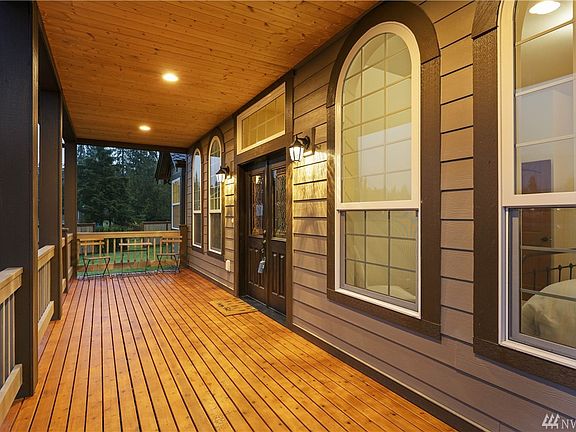 Large Covered Front porch.  Perfect for a large swing.