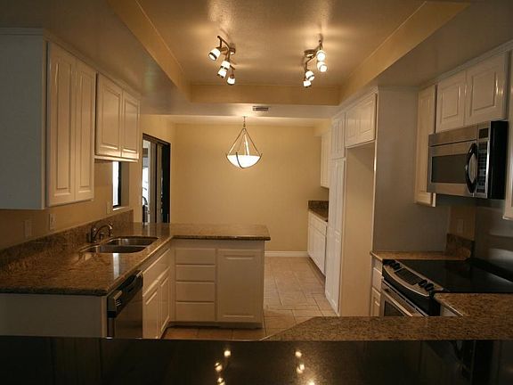 Newly remodeled kitchen, granite counters, ss appliances, new cabinets, & more