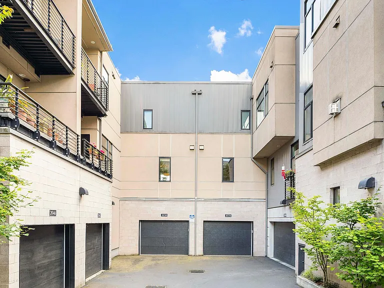 Private/Attached Garage (Additional Guest Parking behind townhouse)