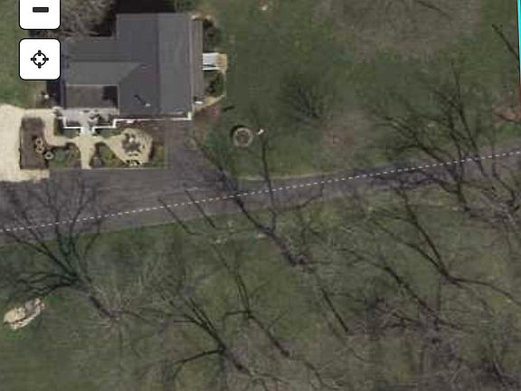 Approximately an acre of yard space. Owner to retain use of other buildings. Minor shoveling and trim mowing by tenant. Plowing and majority of mowing by landlord.