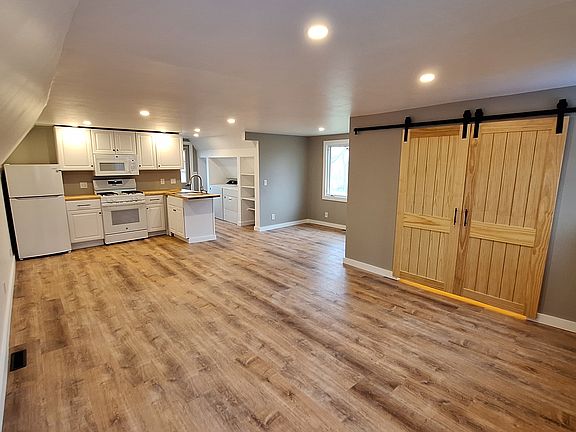 looking back towards the entrance door, closet on the right