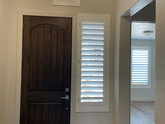 Inside - Front door. Shutters.