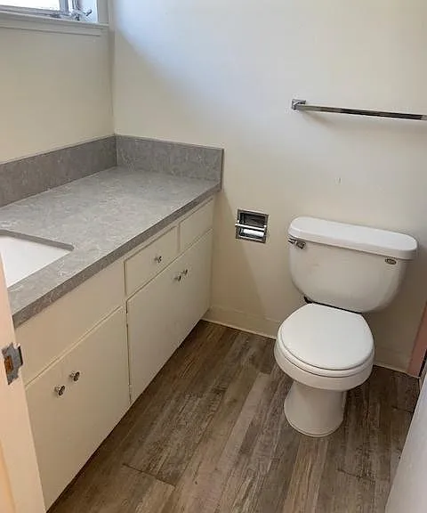 Bathroom with shower over tub
