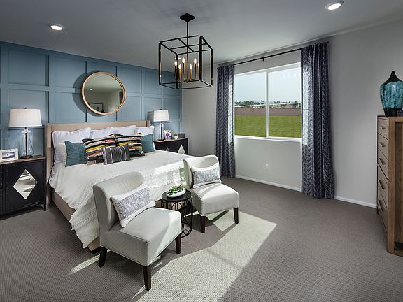 Residence 4 primary suite modeled at a nearby Meritage community.