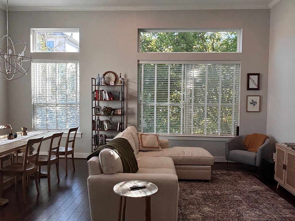 Main living area has a serene quality with unparalleled natural lighting and views. TV is connected to a Denon receiver with built-in speakers in the wall hooked up.