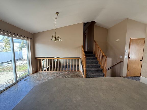view from kitchen to dining and family room