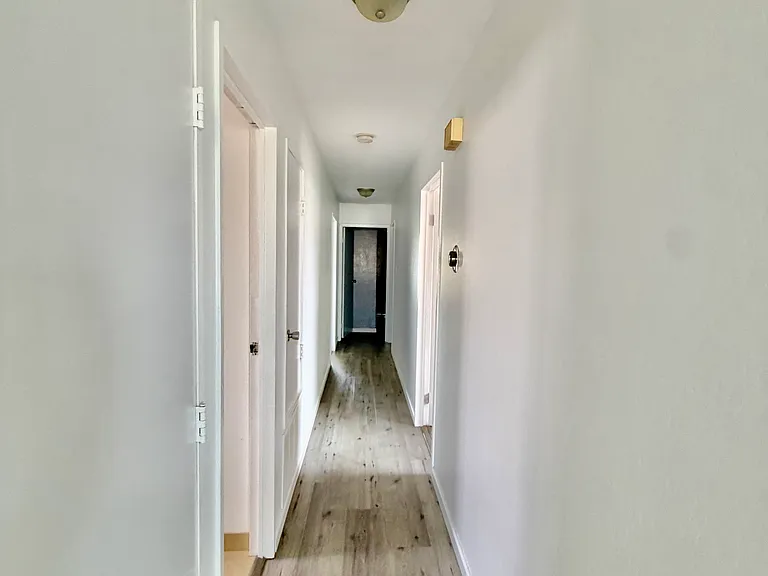 Stairs from garage/In-law unit lead to 2nd Floor hallway