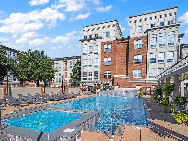 Experience upscale living with this refreshing poolside escape.