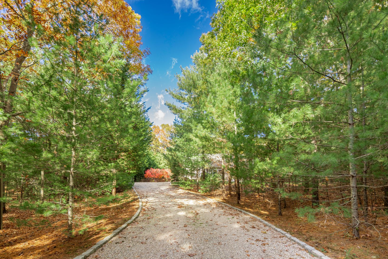  Extensive driveway provides gracious entry and ideal privacy