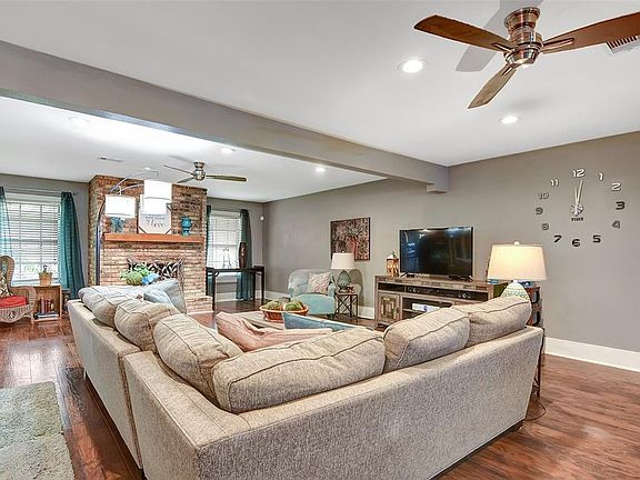 Den is very spacious at almost 30' deep and 30' wide.