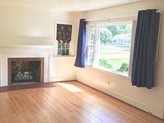 Propane Fireplace. Draperies can remain