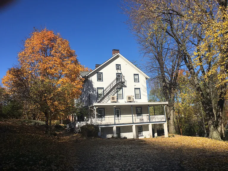 Beautiful renovated 200-year-old historic building! Nestled among mature trees with scenic views. Thoughtfully updated for today's lifestyle.