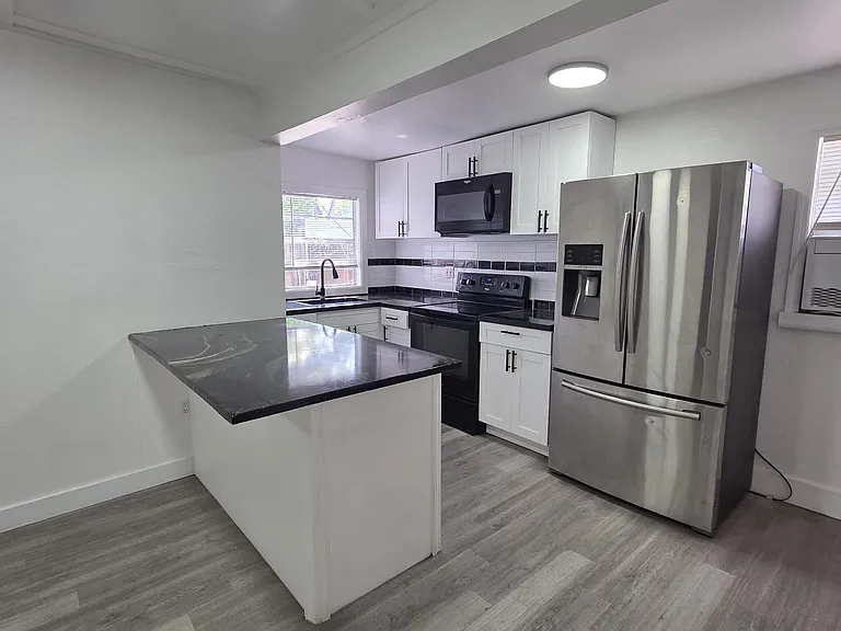 7115 Dellwood Dr #M — Photo 2