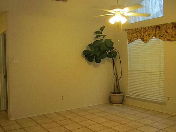 Dining Room with high ceiling and tile floor