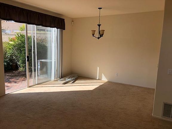 Family room carpet is being replaced with new Tile.