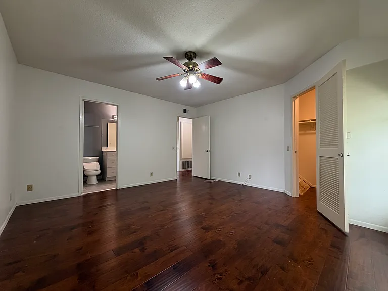 Primary Bedroom
Shown: Private Bathroom Entrance, Entrance to 2nd Floor Hall, and Entrance to Walk-In Closet