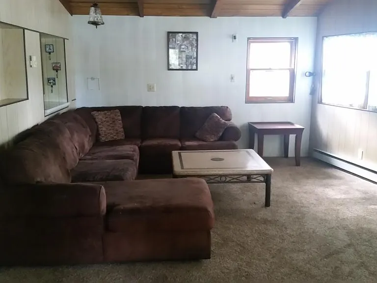 High Vaulted Beamed Ceiling in Comfy Den overlooking the Riv