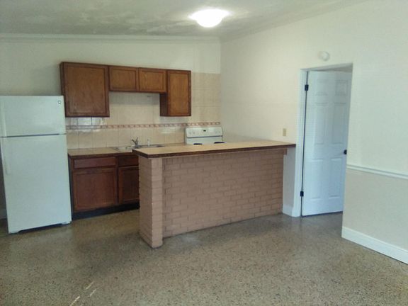 Living Room w/Kitchen view