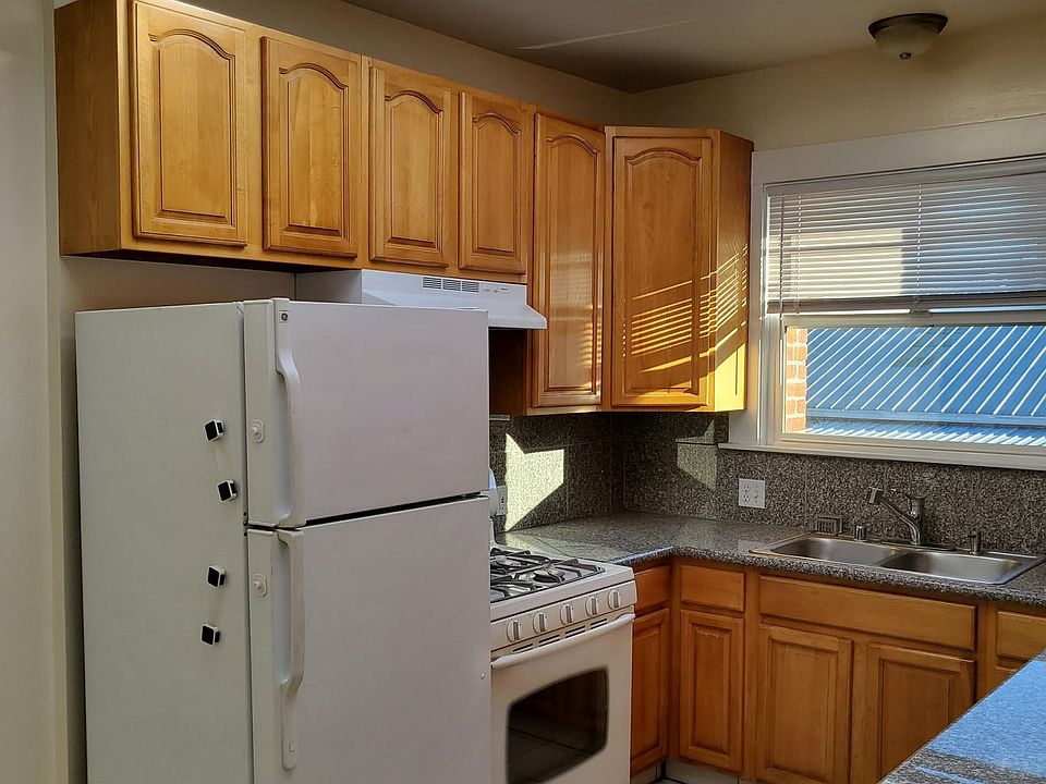 Light-filled kitchen with tall cabinets for lots of storage