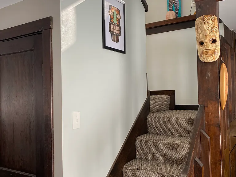 Upstairs is the bathroom and one bedroom.
