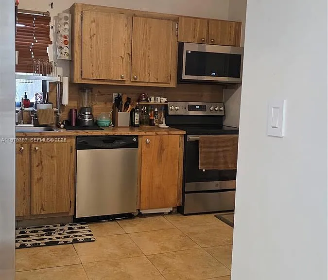 750 NE 199th St #101H — Photo 16