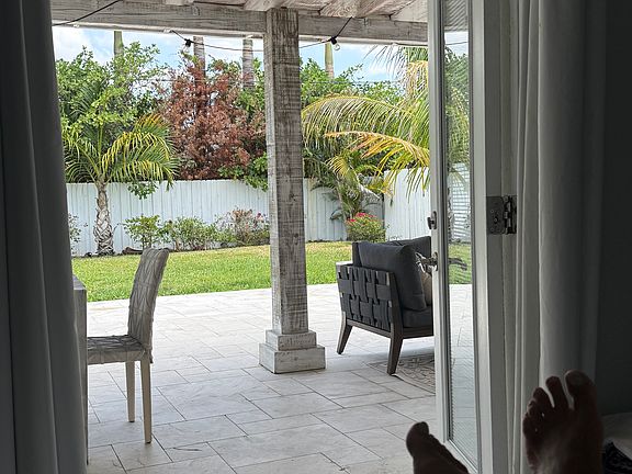 one of the 3 doors that access the backyard