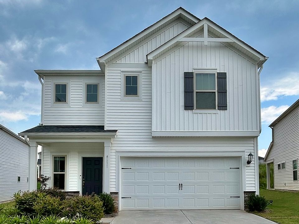 Modern two-story, built in 2022 with a well maintained yard.