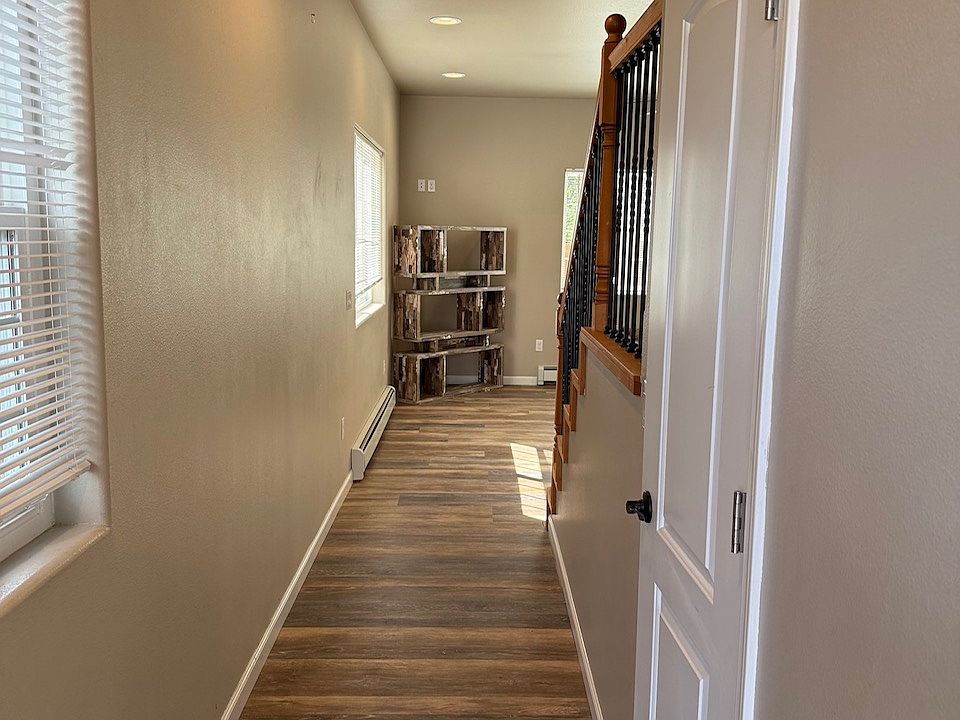 Entry way has coat closet for neat storage of boots, shoes, coats.