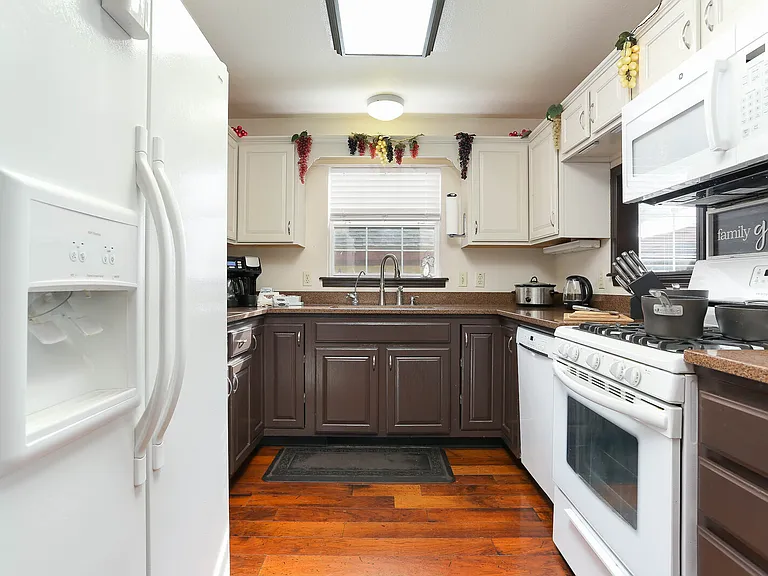 Kitchen with gas stove.
