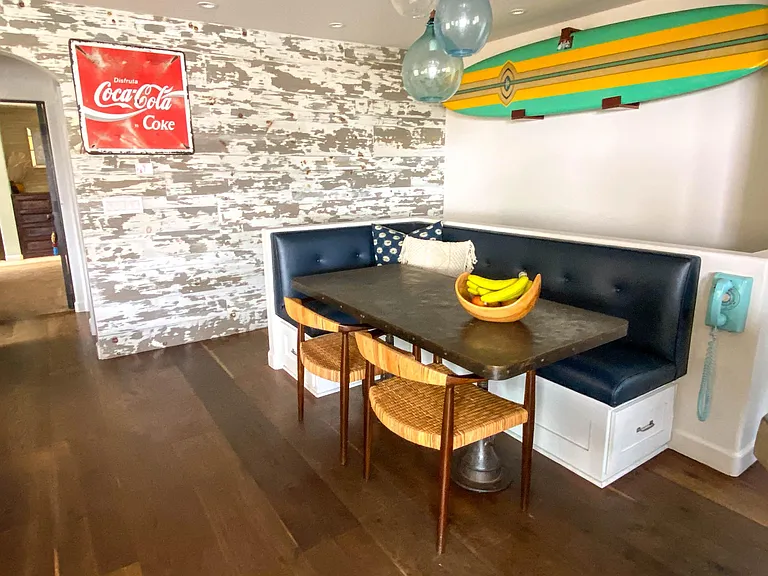 Built in Dining with custom vintage table and storage