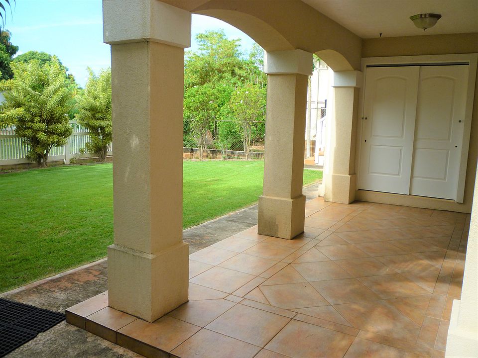 Covered porch with backyard