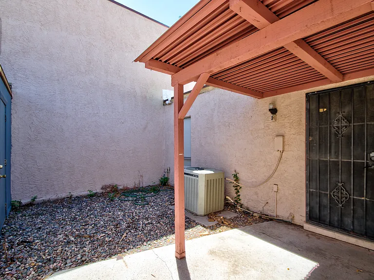 Rear Patio and Separate Storage Room