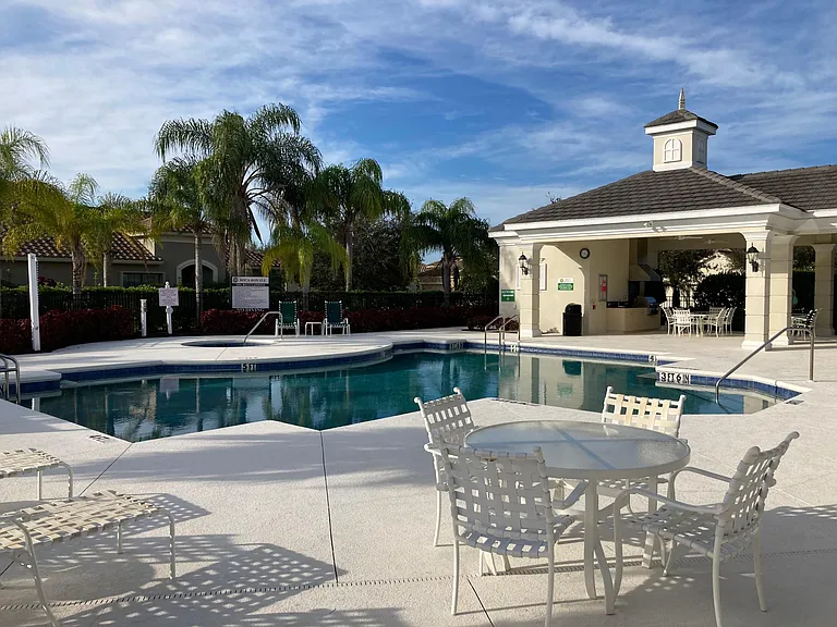 Pool, hot tub and large gas grill and dining area a short 3 minute walk from the home.
