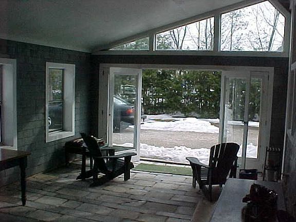 Garden sun room with granite and marble floor.