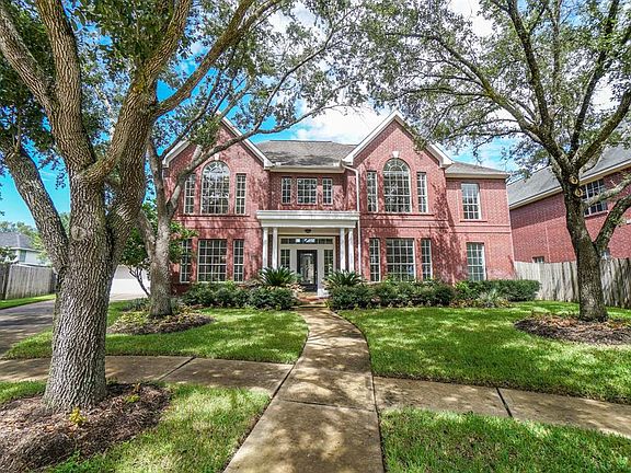 Welcome to 3334 N. Briarpark! Gorgeous brick home situated on a cul-de-sac lot with fantastic mature trees!