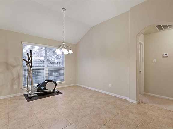 Formal dining area located near to family room and kitchen