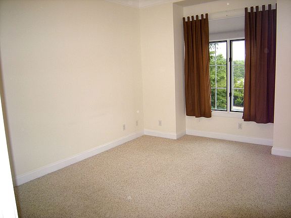Large Master bedroom with spacious walk-in closet.