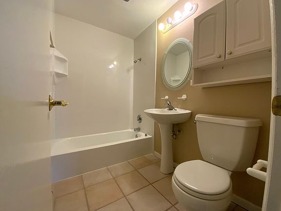 Updated bath with newer plumbing fixtures.
