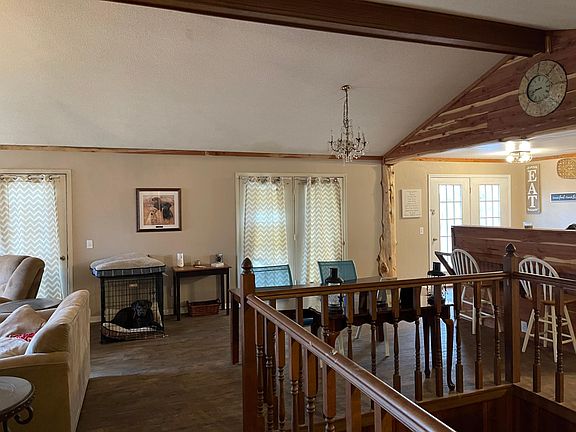 Open living area with French doors to deck