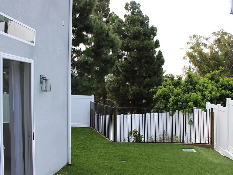 view from gate to the back yard.