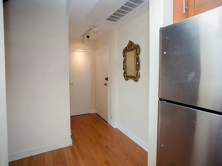 First floor entrance hall with closet