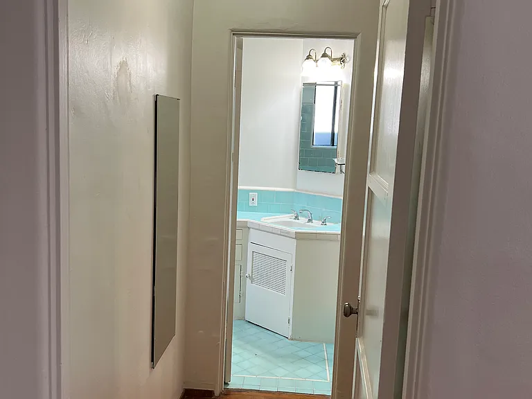 Hallway entry to Bathroom