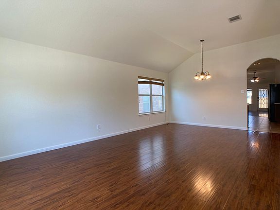 living/formal dining, opposite view. high ceilings! no carpet!